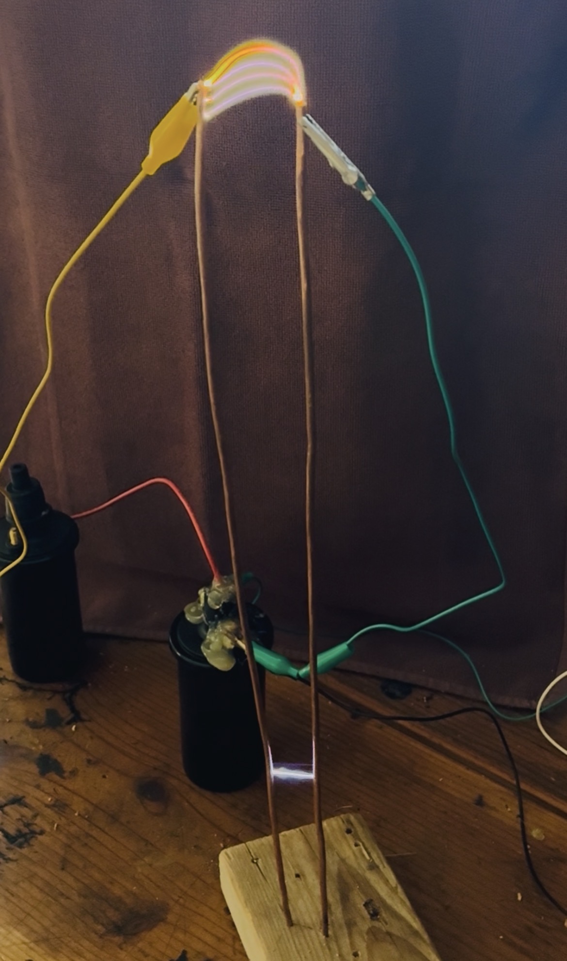 arcs looping back from the top to the bottom of the jacob's ladder